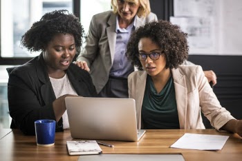 Women in Front of Laptop Computer