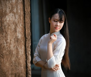 Women in White Long-sleeved Dress