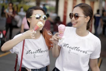 Women In White T-shirts Holding Ice Cream In Cones