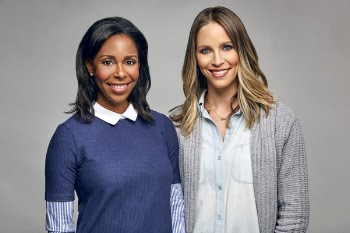 Women Posing for Photo while Smiling