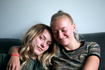 Women Sitting On Couch