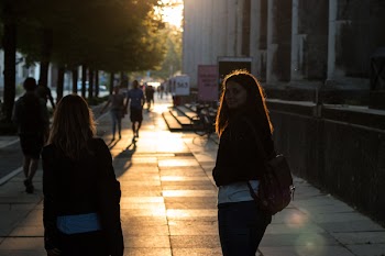 Women Walking on Sidewalk