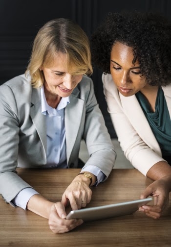 Women Watching Gray Tablet Computer