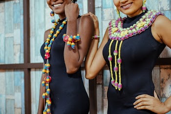 Women Wearing Beaded Necklace