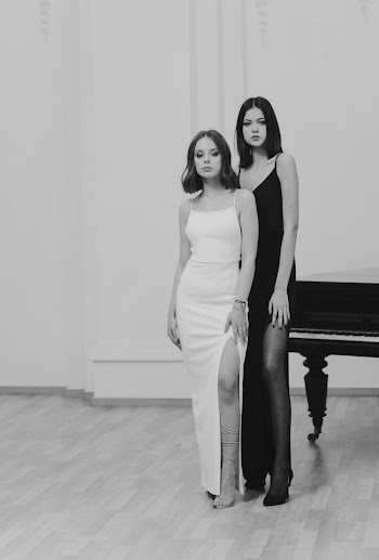 Women Wearing Black and White Dress