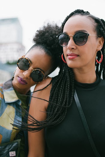 Women Wearing Fashionable Eyewear