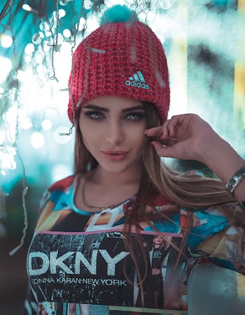 Women Wearing Red Knitted Beanie