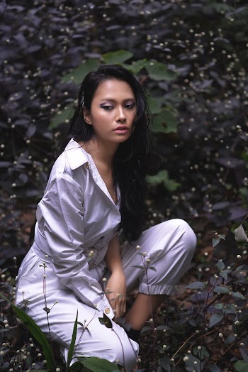 Women Wearing White Dress and Jeans Close-up Photography