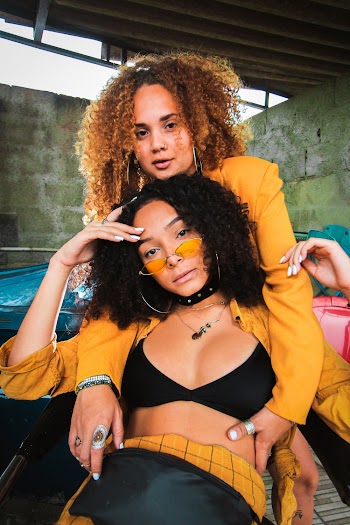 Women Wearing Yellow Jackets