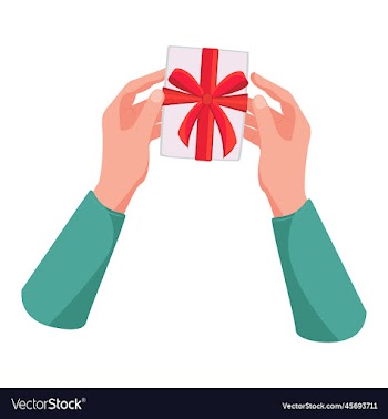 womens hands with a box with a red bow