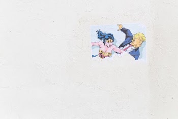 Wonder Woman and Donald Trump painting on white surface