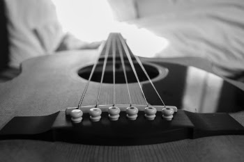 Wooden Acoustic Guitar Macro Photography in Grayscale Photo