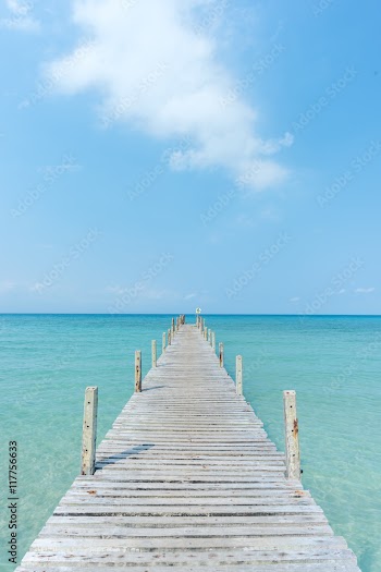 Wooden bridge to the ocean