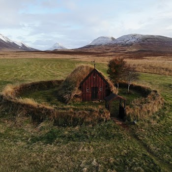 Wooden House Beside Field