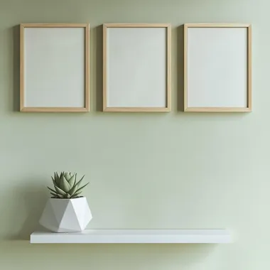 Wooden picture frames on white shelf in modern living room decor