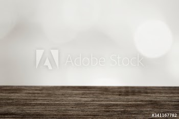 Wooden plank with gray bokeh pattern background