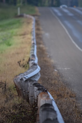 Wooden Small Fences Along the Road