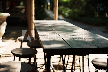 Wooden table of the outdoors cafe