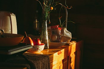 Wooden Table With Clear Glass Vase