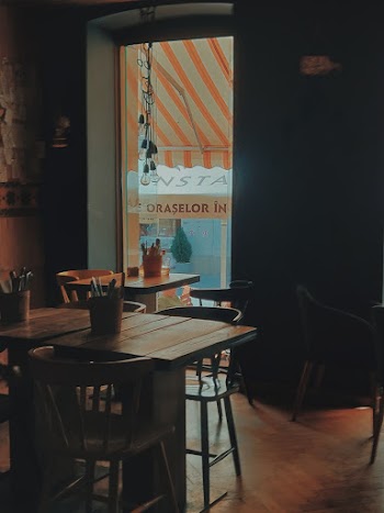 Wooden Tables And Chairs In A Restaurant