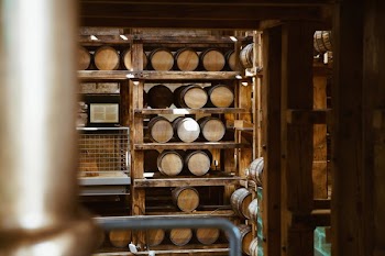 Wooden Wine Barrels On Shelf