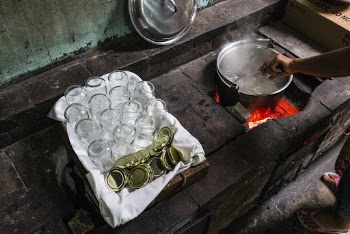 Worker boiling jam jars in the kitchen. | Free Photo - rawpixel