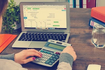  Working finances on a laptop 