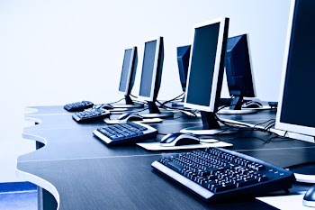 workplace room with computers in row