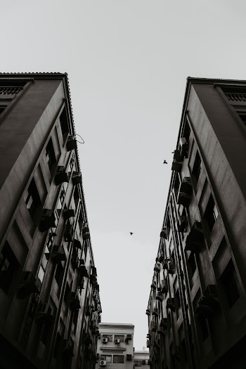 Worm's Eye View of 2 Condominium Buildings