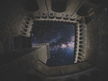 Worm's Eye View Of Building During Night