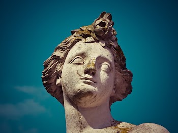 Worm's Eye View of White Concrete Statue Under Clear Blue Sky during Daytime