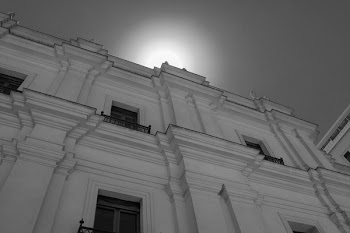 Worm's Eyeview of White Concrete Building Under Sunny Clear Sky