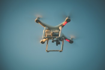 Worm's Eyeview Photo of White Quadcopter