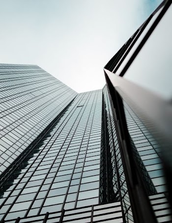 worm's eye view of glass building