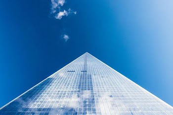 worm's eye view of glass building
