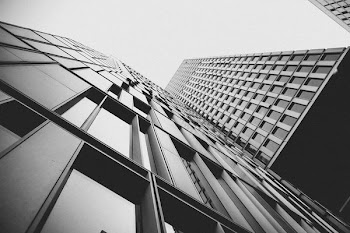 worm's eye view of glass buildings