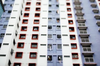 worm's eye view of white and gray building during daytime