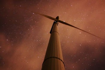 worm's eye view of wind turbine
