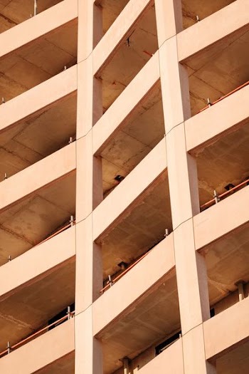 worm's-eye view photography of white concrete building