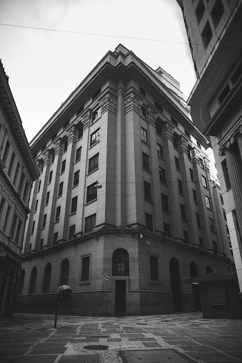 Worms-eye View of a Gray Concrete Buildings