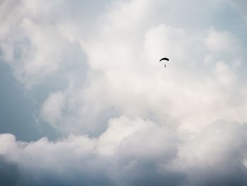 worms eye view photography of person paragliding