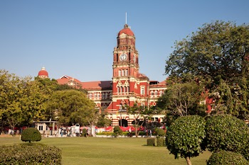 Yangon, Myanmar - 2016, December 23 : The colonial High Court building completed in 1911 in downtown Yangon next to Maha Bandula park, Burma