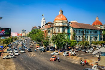YANGON, MYANMAR - DEC 19 : The traffic jam at Strand road intersection in downtown of Yangon DEC 19 2014 Myanmar.