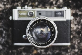 Yashica Camera on Brown Surface