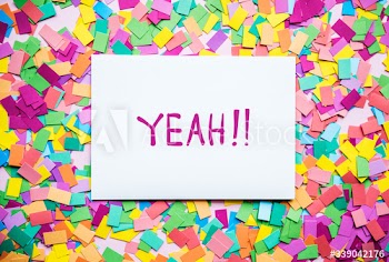 Yeah! text on paper and colorful party confetti background party concept