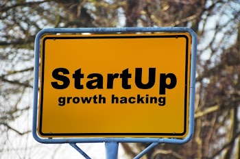 Yellow and Black Start Up Growth Hacking Signage