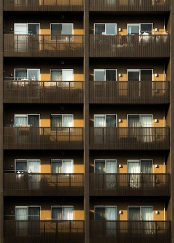 Yellow and Brown High-rise Building