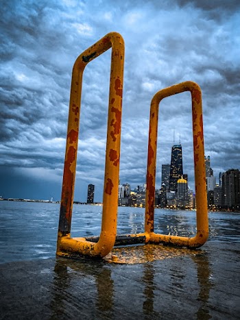 Yellow and Red Metal Swimming Pool Ladder