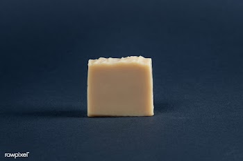 Yellow bar soap on a dark backgroud | Free  photo - 2293309