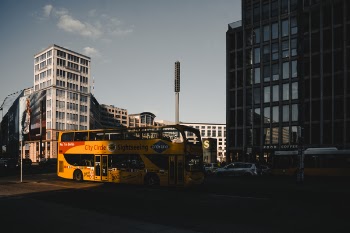 Yellow Bus Parked Near Building